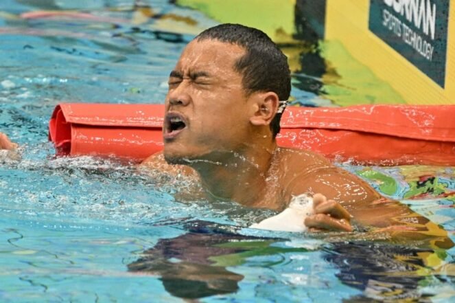 Medali emas pertama untuk Merah Putih berhasil dipersembahkan Maulana Rifky Yavianda dari cabang olahraga para renang nomor 100 meter gaya bebas putra klasifikasi S12, Senin (19/10).(foto:dok/NPC Indonesia)